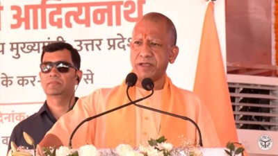 Uttar Pradesh Chief Minister Yogi Adityanath addresses the gathering in Lucknow on Wednesday. 