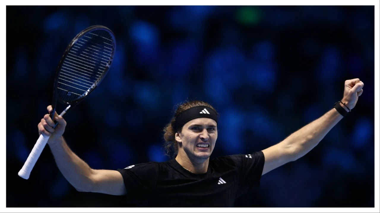 Alexander Zverev celebrates winning his group stage match against Ben Shelton.