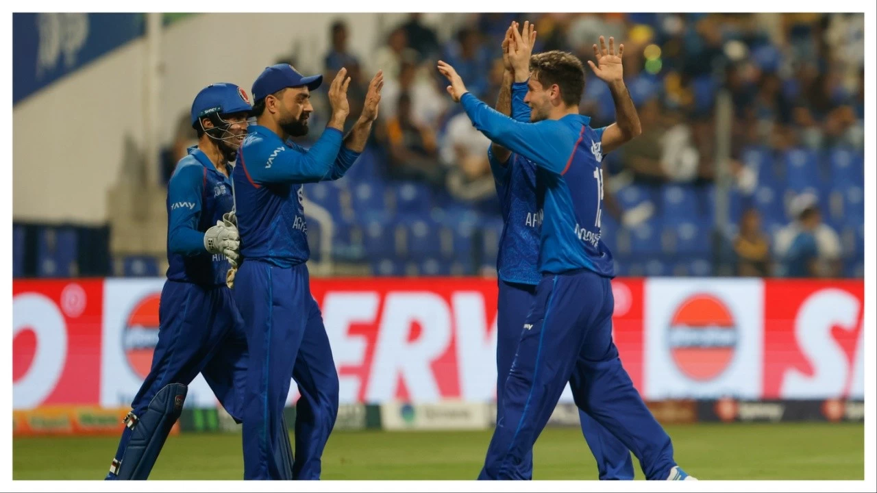 Afghanistan players celebrate during their match against Sri Lanka on September 18, 2025 in Abu Dhabi.