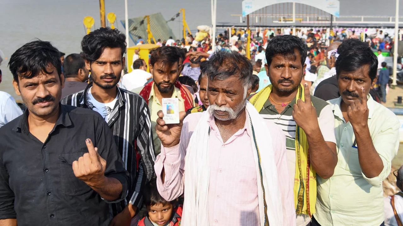 Voters show their ink-marked fingers after casting their votes during the first phase of the Bihar Assembly elections. (Photo credit: PTI)