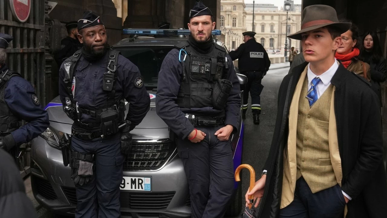 Pedro Elias Garzon Delvaux aka “Fedora Man” from the viral Louvre photo. (Source: AP)