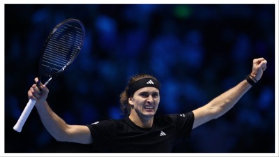 Alexander Zverev celebrates winning his group stage match against Ben Shelton.