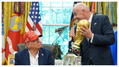 FIFA president Gianni Infantino, right, with the World Cup trophy along woth US President Donald Trump on August 22 in Washington.
