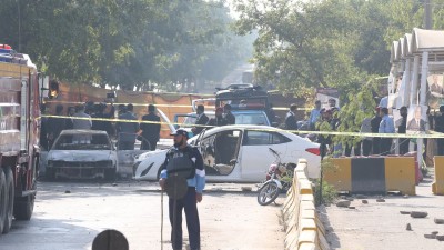 Security forces take measures at the scene where at least 12 people were killed and several others injured in an explosion outside a court complex in Pakistan&#039;s capital, Islamabad, on November 11, 2025.
