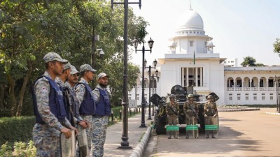 Dhaka: Security personnel keep vigil outside the International Crimes Tribunal after it sentences ousted former Prime Minister Sheikh Hasina to death in absentia for crimes against humanity in Dhaka, Bangladesh on Monday. (PTI Photo)