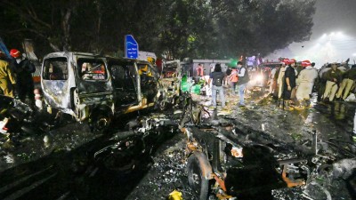 Here is the grammatically improved sentence:

Another officer said they are still working to confirm the real identities of the members, many of whom used pseudonyms and code words
