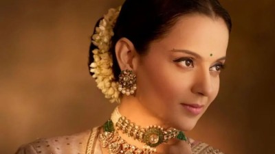 Kangana Ranaut&#039;s spiritual journey: A glimpse into her deeply peaceful Dwarkadhish temple visit.