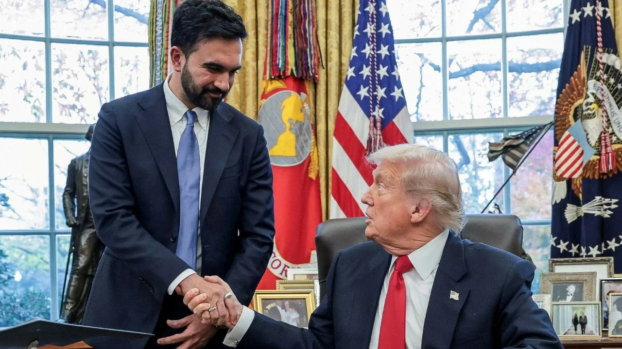 US President Donald Trump and New York City Mayor-elect Zohran Mamdani shake hands as they meet in the Oval Office at the White House in Washington D.C