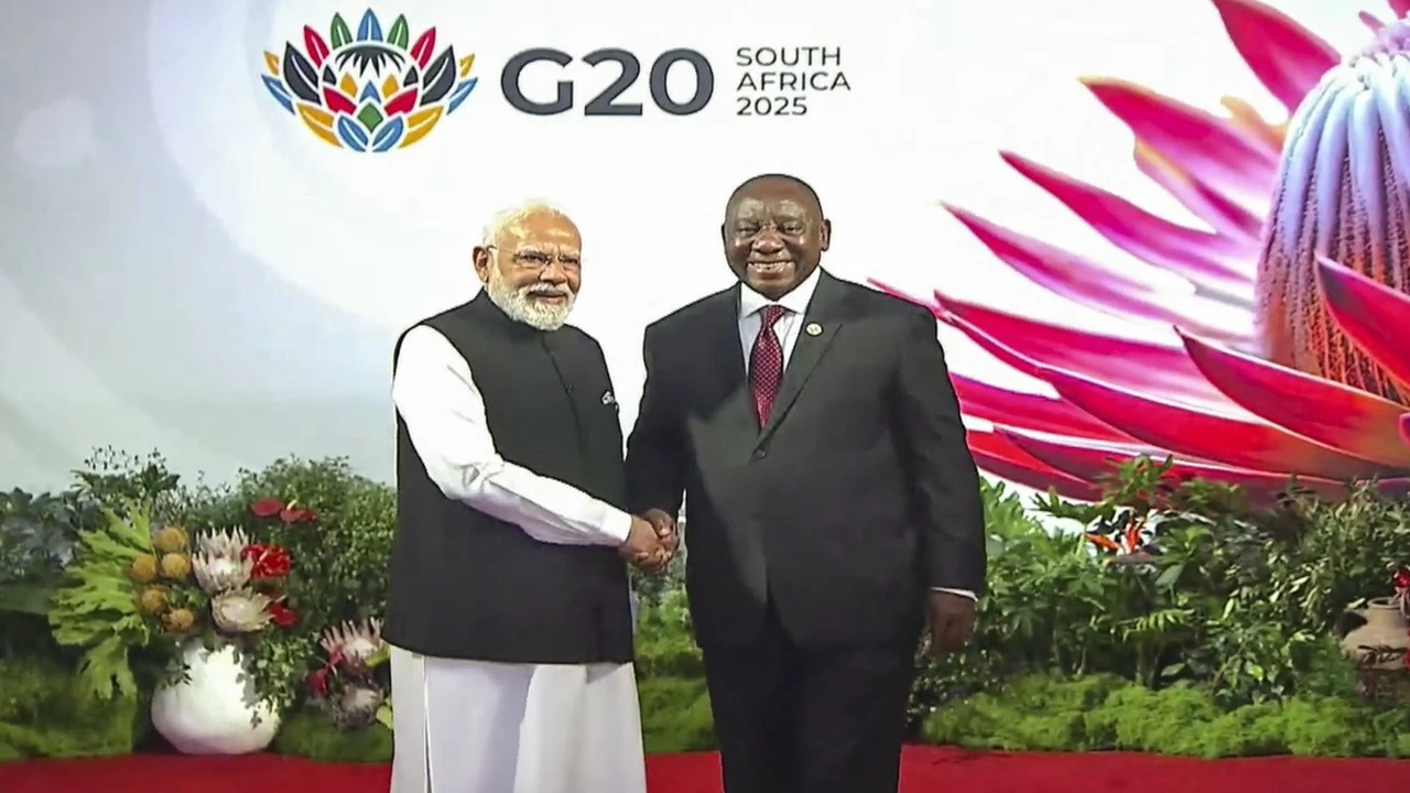 Prime Minister Narendra Modi being welcomed by South African President Cyril Ramaphosa upon his arrival to attend the G20 Summit in Johannesburg. 