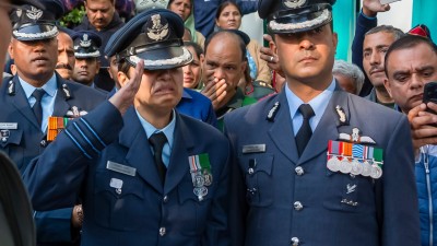 Wing Commander Afshan Akhtar salutes her husband’s mortal remains in Kangra, Himachal Pradesh.
