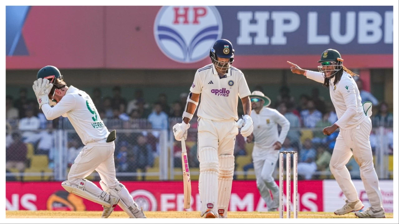 Washington Sundar, center, walks off the ground after being dismissed in Guwahati on Monday.