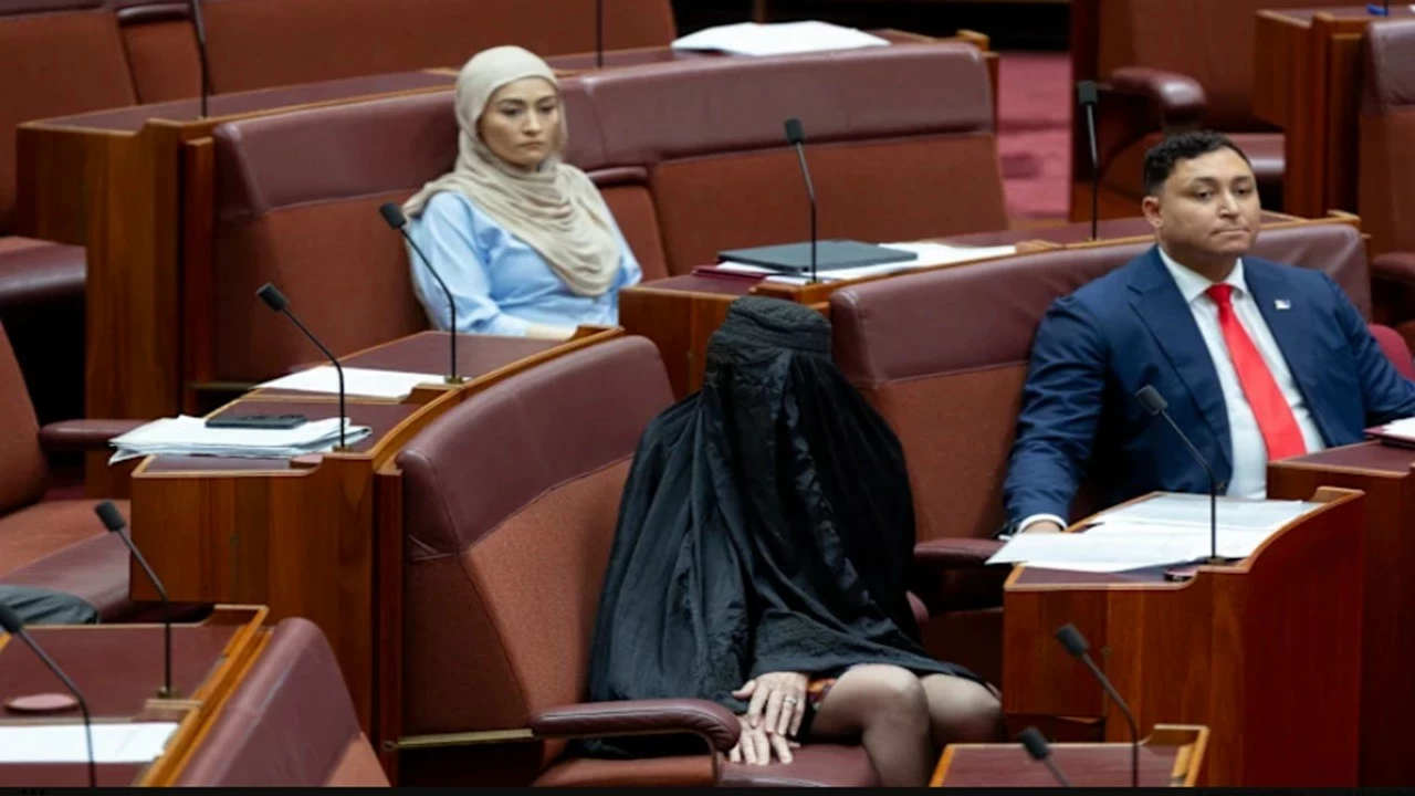 Senator Pauline Hanson donned the burqa as a political call to ban the Muslim garment in public places in Australia. (@JJKALE2/X)