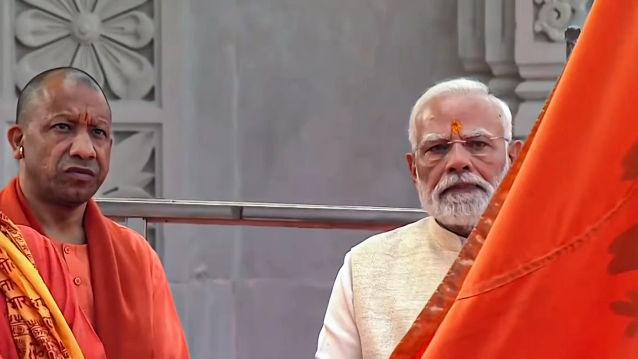 Prime Minister Narendra Modi with Uttar Pradesh Chief Minister Yogi Adityanath during the Dhwajarohan ceremony at the Ram Temple. (Photo credit: PTI)