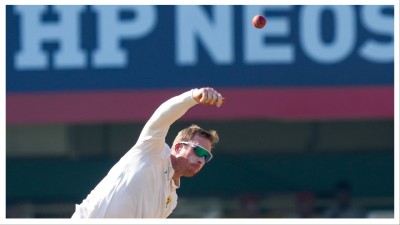 Simon Harmer bowls at ACA Stadium, Barsapara in Guwahati on Wednesday.