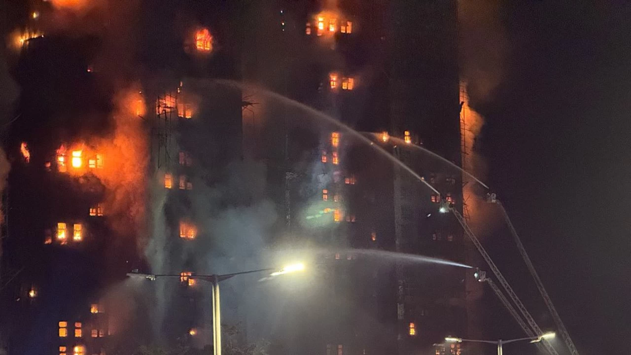 A deadly fire engulfed several high rise buildings in Hong Kong on Wednesday afternoon. The fire has claimed at least 44 lives so far and injured hundreds of people. (Photo credit: Getty Images)