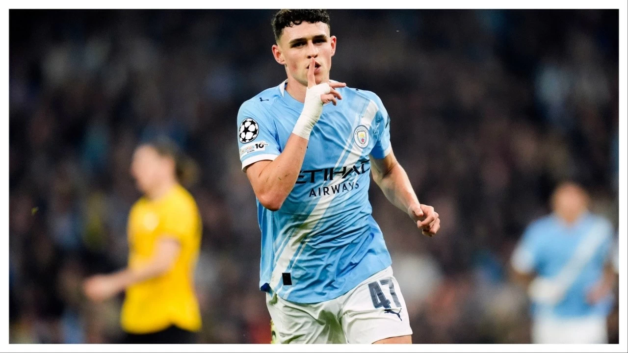 Manchester City&#039;s Phil Foden celebrates after scoring.
