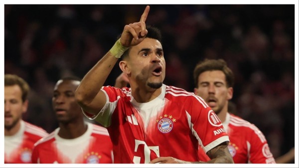 Luis Diaz celebrates after scoring.