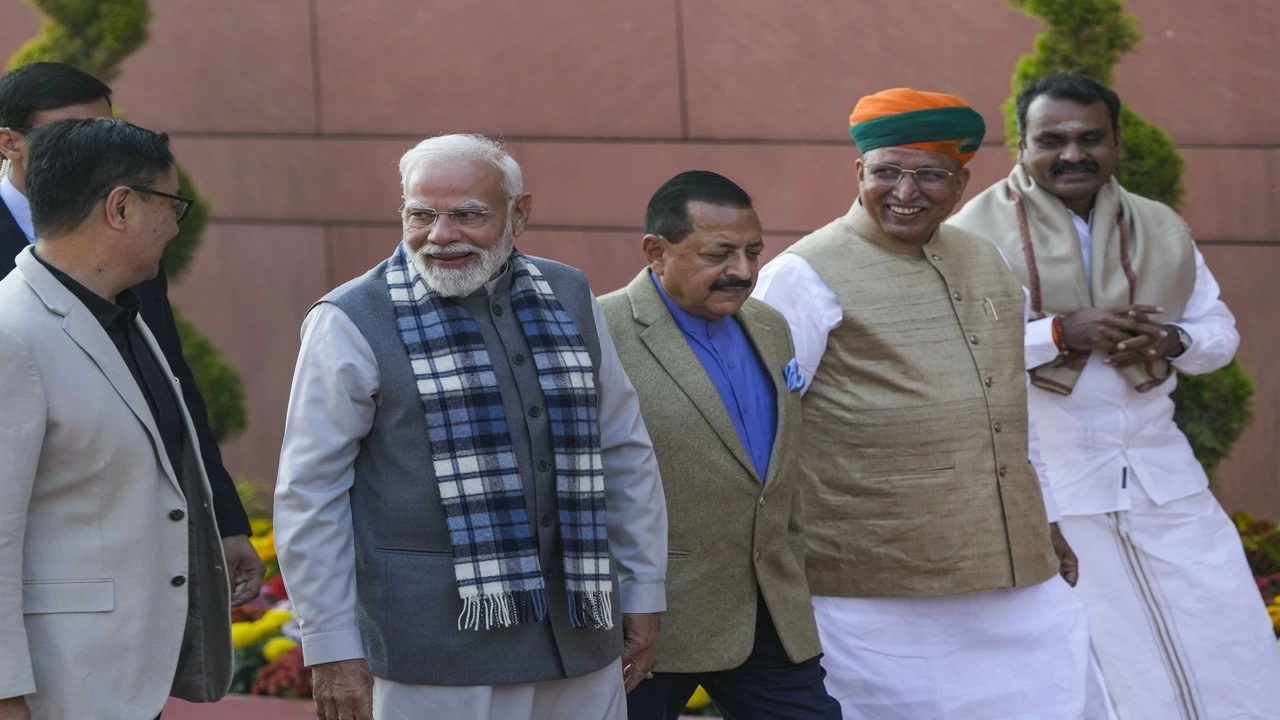 Prime Minister Narendra Modi arrives on the first day of the Winter Session of Parliament in New Delhi on Monday. 