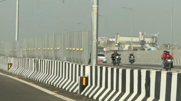 A commuter travelling on the route posted a video on social media, showing long empty gaps along the central divider where iron rods were supposed to be fixed.