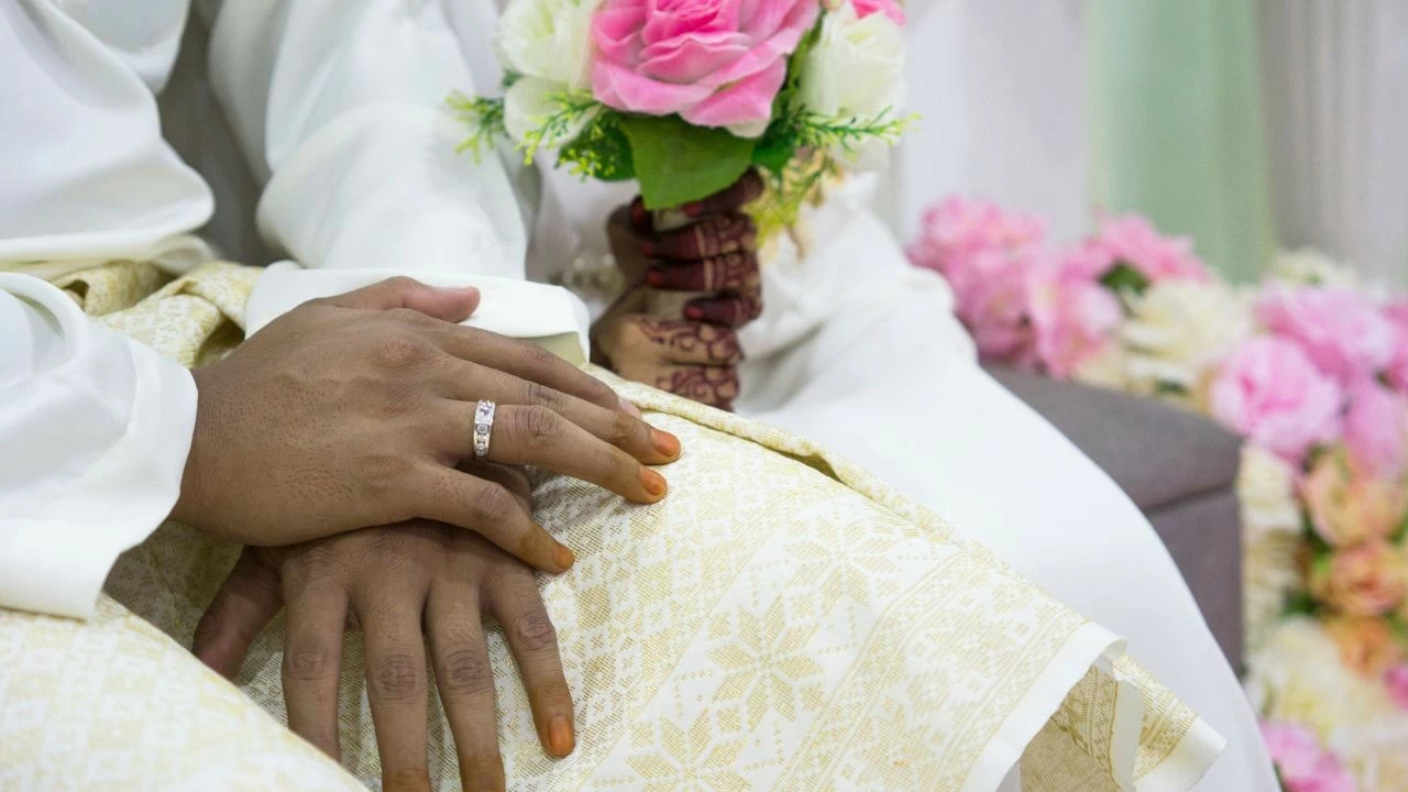 Members of the groom’s side protested, but the Imam stood firm.