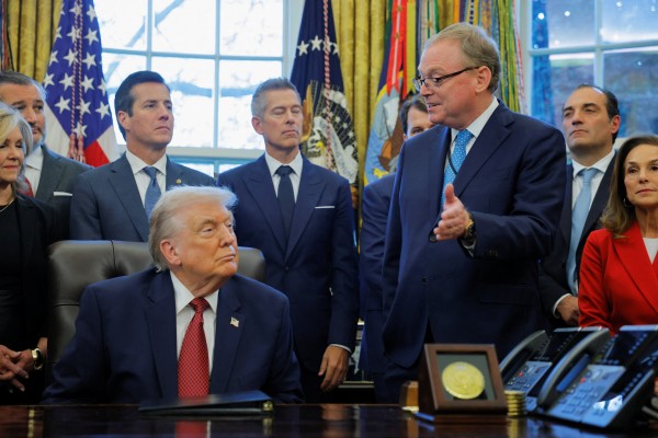 National Economic Council Director Kevin Hassett with US President Donald Trump in the Oval Office at the White House.