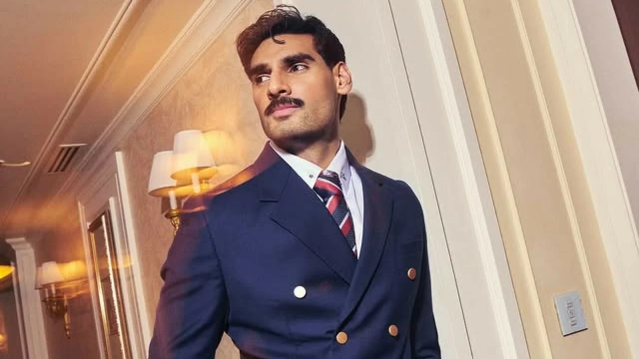 Moustache-groomed looks with slick hair add a classic edge to modern neutrals.