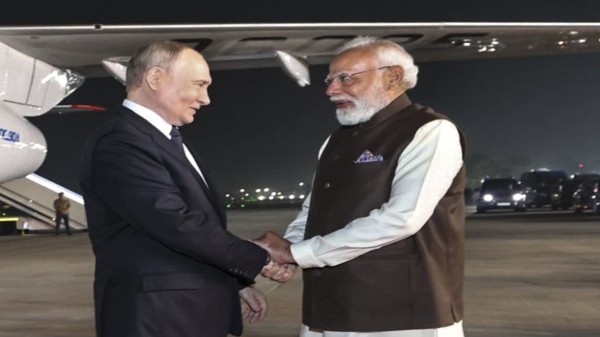 Prime Minister Narendra Modi receives Russian President Vladimir Putin upon latter's arrival in New Delhi. (@narendramodi/X via PTI Photo)