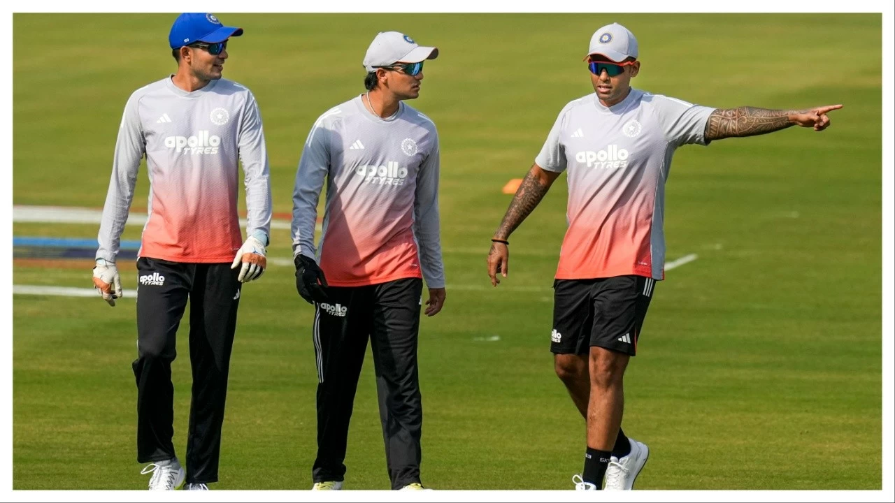 Suryakumar Yadav, right, with Shubman Gill, left, and Abhishek Sharma at Barabati Stadium in Cuttack on Monday.
