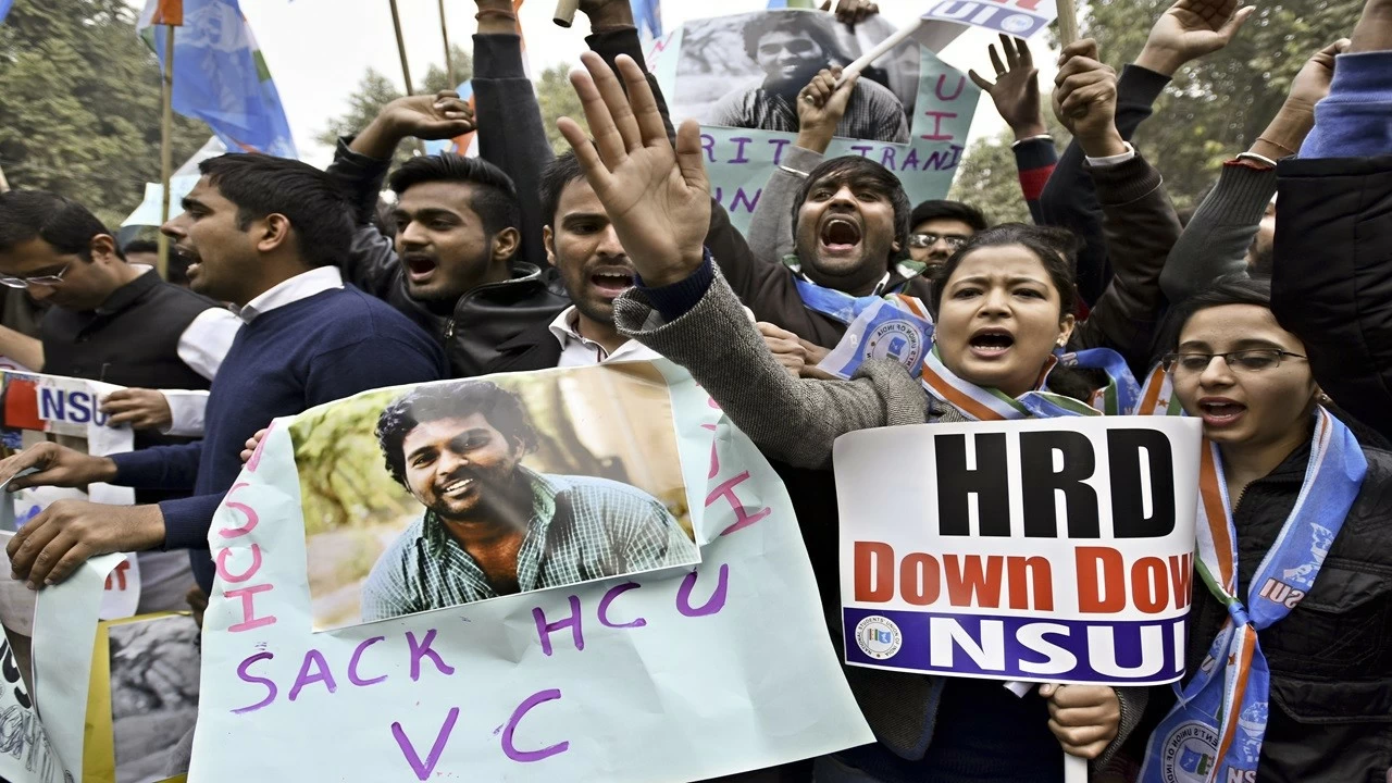 NSUI students shout slogans against Union Minister Bandaru Dattatreya during a protest against the suicide of Research scholar Rohit Vemula in front of HRD Minister Office at Shastri Bhawan on January 19, 2016 in New Delhi. (Photo by Arun Sharma/Hindustan Times via Getty Images)
