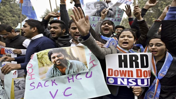NSUI students shout slogans against Union Minister Bandaru Dattatreya during a protest against the suicide of Research scholar Rohit Vemula in front of HRD Minister Office at Shastri Bhawan on January 19, 2016 in New Delhi. (Photo by Arun Sharma/Hindustan Times via Getty Images)