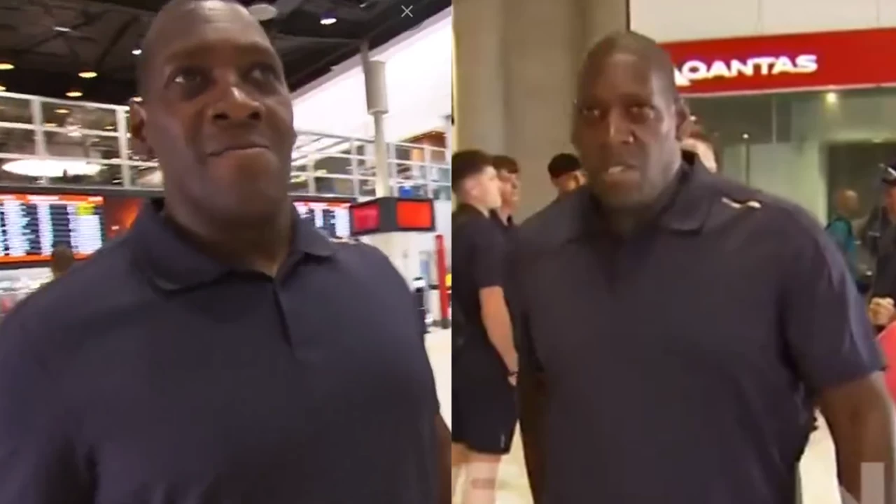 A security member of the England cricket team clashed with the Australian media at Brisbane airport.