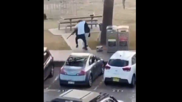 A footage has gone viral in which the unarmed 43-year-old fruit shop owner Ahmed is seen tackling the gunman from behind as he opened fire on civilians. (Photo: X)
