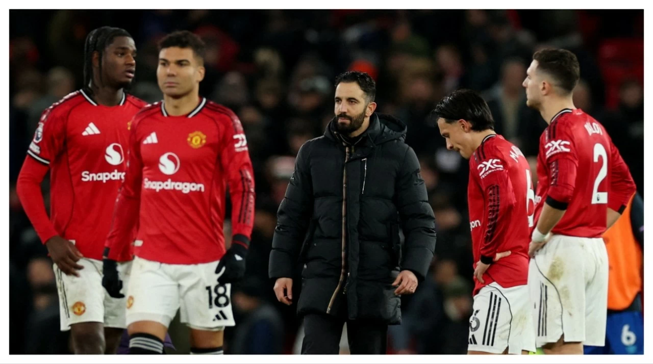 Manchester United manager Ruben Amorim (centre) ad players react after their EPL match.