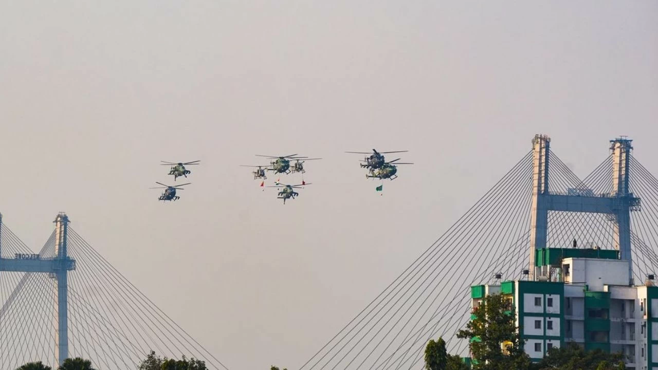 Helicopters fly in formation over Kolkata’s skyline as part of Vijay Diwas commemorations, honoring the valor of our armed forces