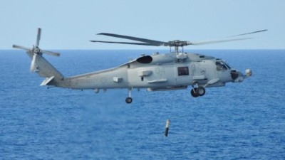 The MH-60R Romeo helicopter conducts functional testing of the newly fitted Airborne Low Frequency Sonar System (ALFS). (Photo credit: Royal Australian Navy)