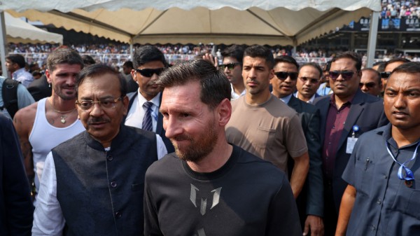 Lionel Messi with Aroop Biswas during his whirlwind tour of Kolkata. (Photo credit: Reuters)

