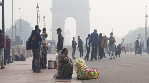 New Delhi battles severe air pollution with dense smog and fog, creating hazardous conditions and poor visibility.