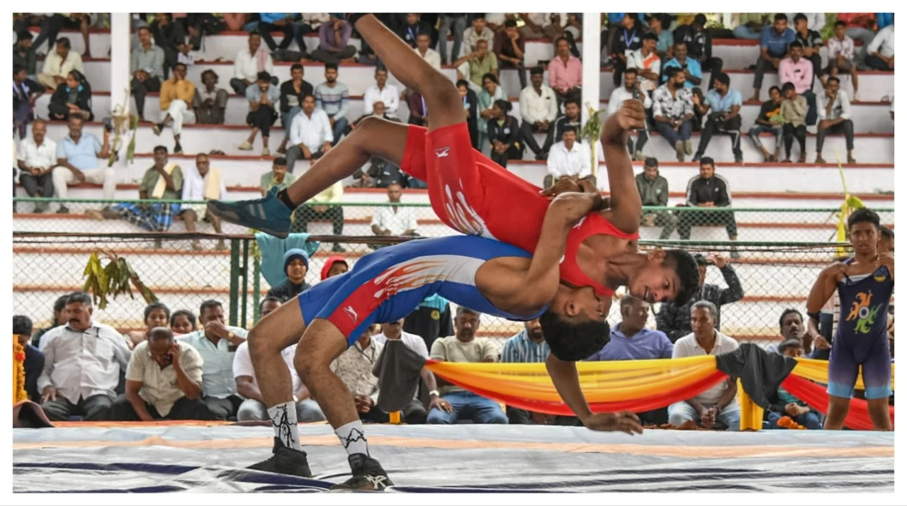 Players in action at a wrestling match during the 'Dasara' festival celebrations, in Mysuru on Sept. 24.