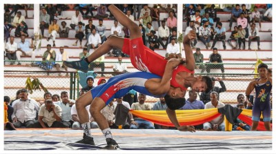 Players in action at a wrestling match during the 'Dasara' festival celebrations, in Mysuru on Sept. 24.