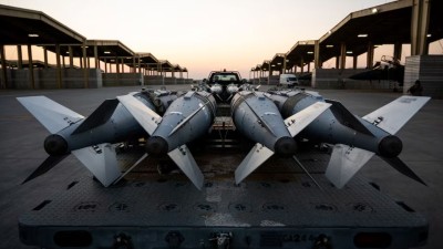 US Airmen prepare to load GBU-31 munition systems onto F-15E Strike Eagles within the US Central Command area of responsibility, December 19, 2025, in support of Operation Hawkeye Strike