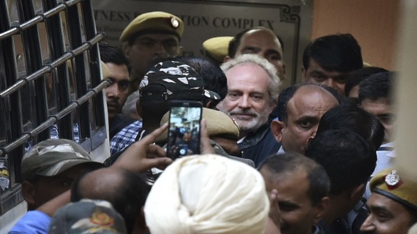 Michel has been an accused in the two cases filed by both agencies.