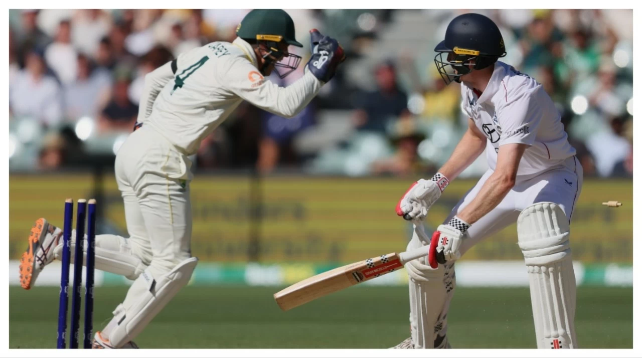 England's Zak Crawley reacts after he was out stumped by Australia's Alex Carey, left, in Adelaide on Saturday.
