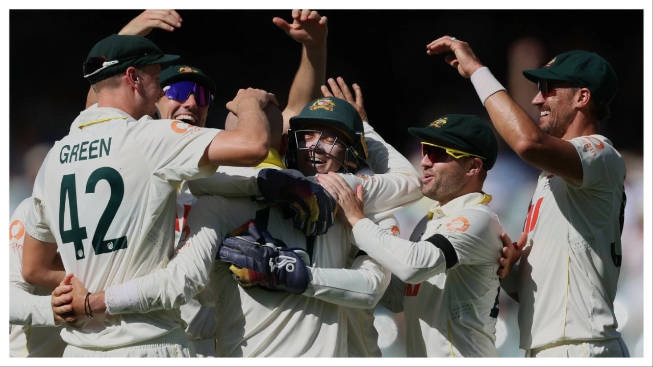 Australia's Nathan Lyon, third left, is congratulated by teammates after dismissing England's Ben Stokes in Adelaide on Dec. 20.