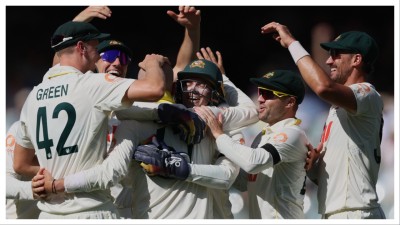 Australia's Nathan Lyon, third left, is congratulated by teammates after dismissing England's Ben Stokes in Adelaide on Dec. 20.