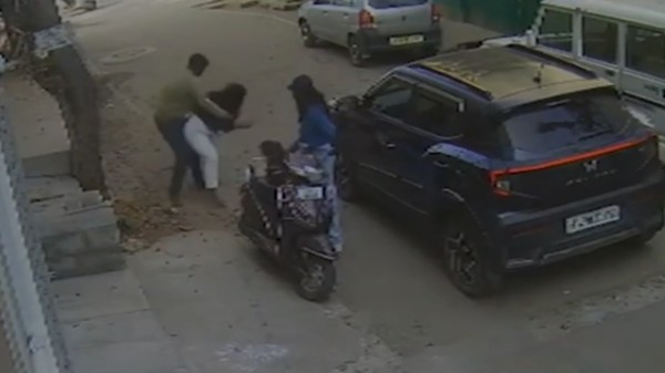 The clip shows the accused repeatedly hitting the woman on her head and back and dragging her along the road. (Screengrab: X)