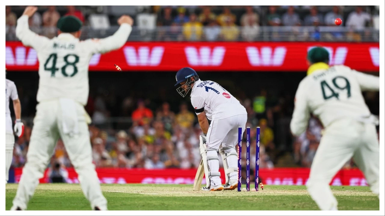 England's Ben Duckett looks back after bowled out by Australia's Scott Boland during the second Ashes Test between Australia and England in Brisbane on Dec. 6, 2025. 