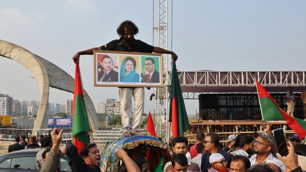 BNP supporters prepare to welcome Tarique Rahman, in Dhaka
