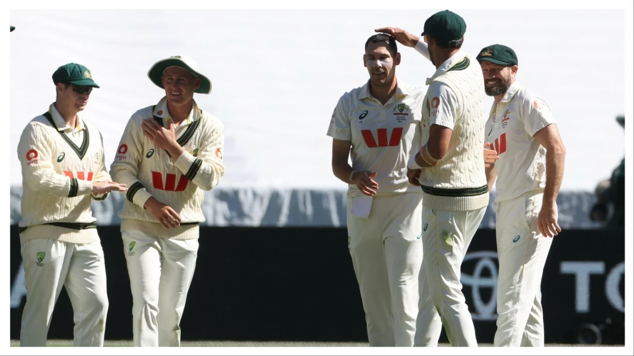 Australia's Scott Boland, third right,celebrates England's Jamie Smith's wicket during their Ashes Test match in Melbourne on Friday.