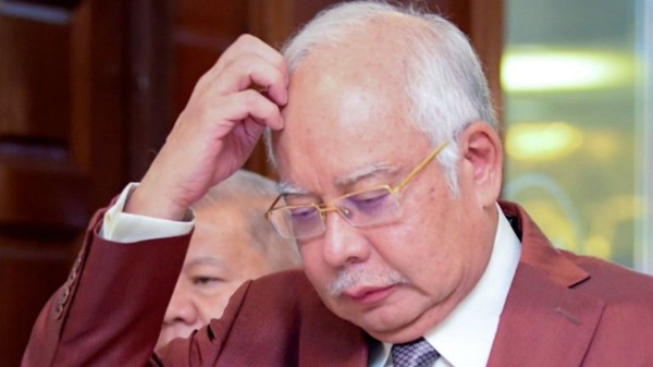 Najib Razak has been found guilty on all four abuse-of-power charges and all 21 money-laundering charges