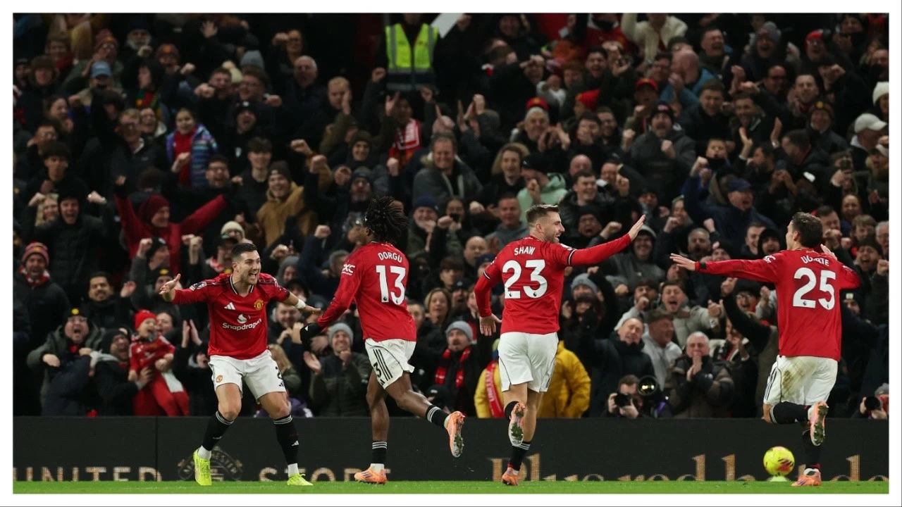 Manchester United players celebrate their goal against Newcastle United on Friday.